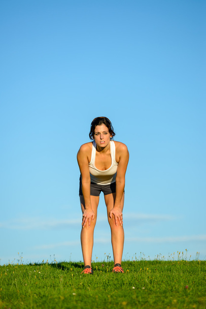Woman resting after running outdoor - Φωτογραφία, εικόνα