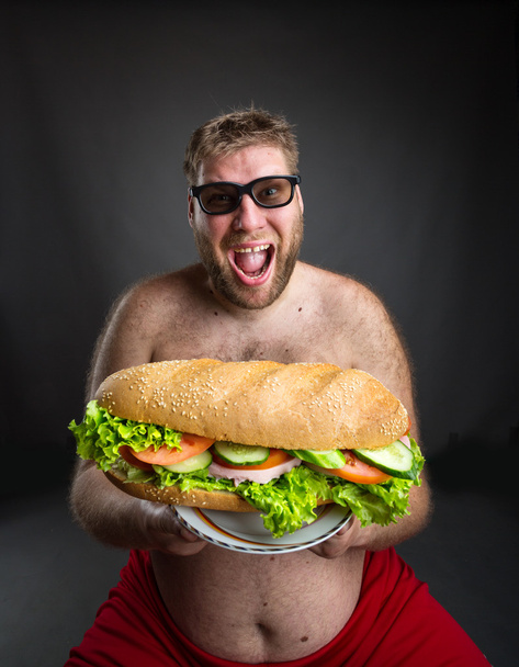 grasso uomo con panino
 - Foto, immagini