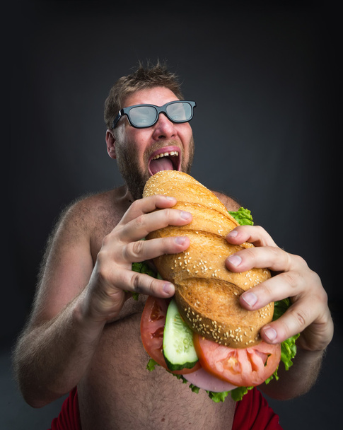 Fat Man met sandwich - Foto, afbeelding