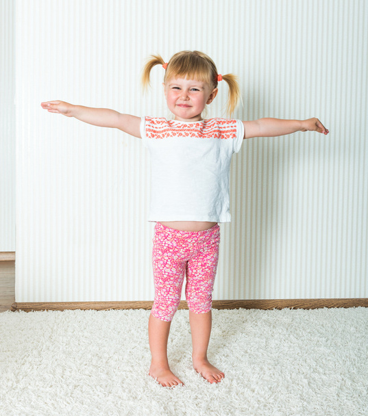 happy little  girl engaged in physical activity  - 写真・画像