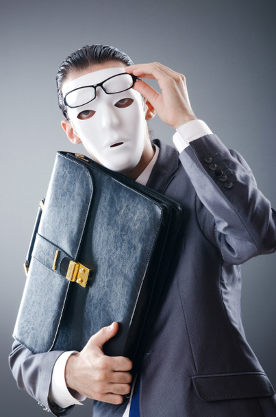 Industrial espionate concept with masked businessman - Photo, Image