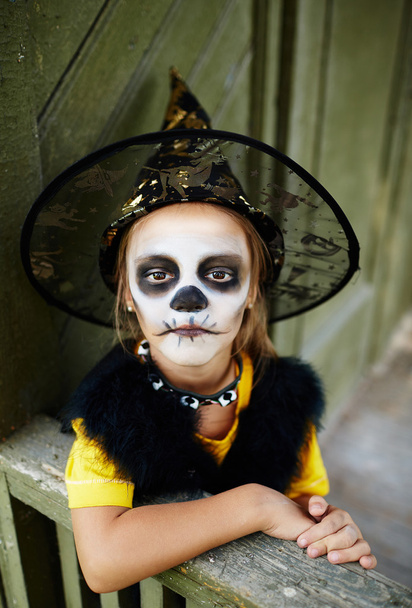 Хеллоуїн дівчина з пофарбованим обличчям
 - Фото, зображення