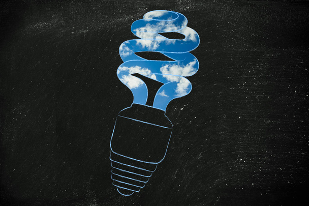 energy saving bulb with a sky fill - Foto, Bild
