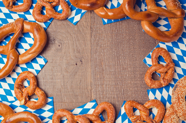 wooden board and pretzels - Фото, зображення