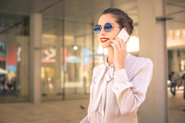 Businesswoman doing a phone call - Photo, image