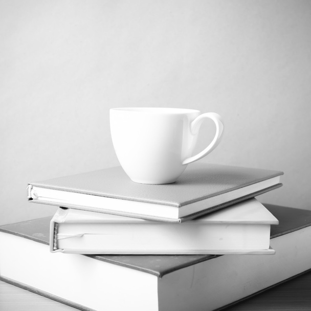 stack of book with coffee cup black and white color tone style - Photo, image