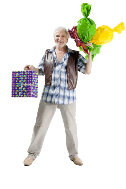 senior man with candies and gift bag - Photo, Image