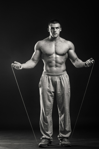 man holding skipping rope - Foto, Imagen