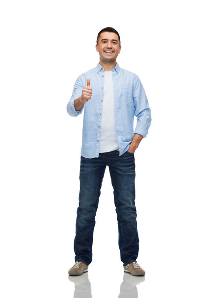 smiling man showing thumbs up - Foto, Imagem