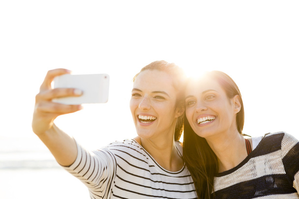 best girl friends taking a selfie - Valokuva, kuva
