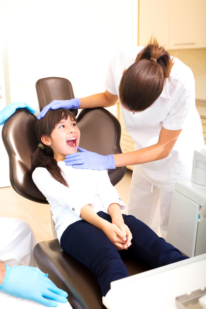 Little girl at the dentist  - Fotó, kép