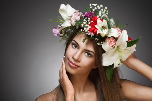 Beautiful woman with flower wreath. Space for text. - Photo, image