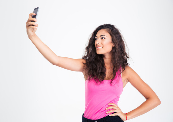 Teen girl making selfie photo on smartphone  - Fotó, kép
