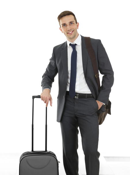Man holding suitcase  - Fotografie, Obrázek