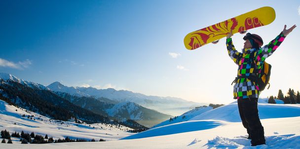 Sport man in snowy mountains - Foto, imagen