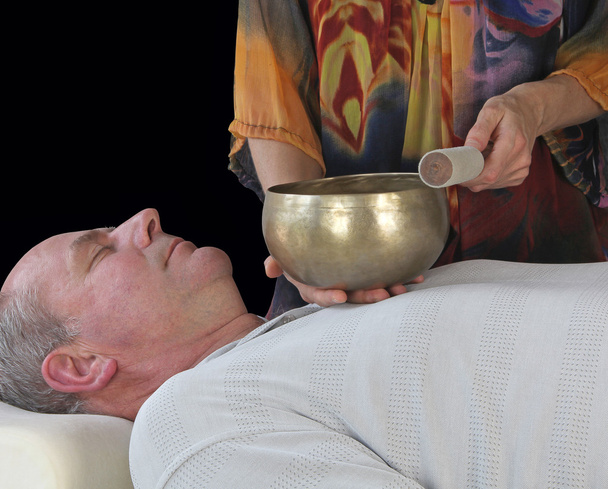 Sound Healer working with Tibetan Singing Bowl - Photo, Image