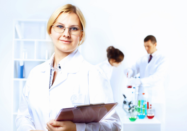Scientists in laboratory - Фото, изображение