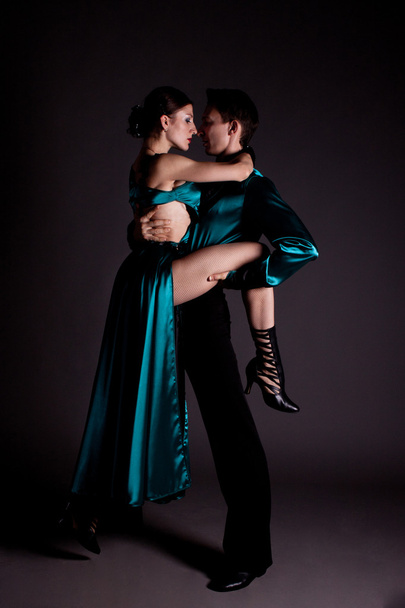 Dancers against black background - Foto, immagini