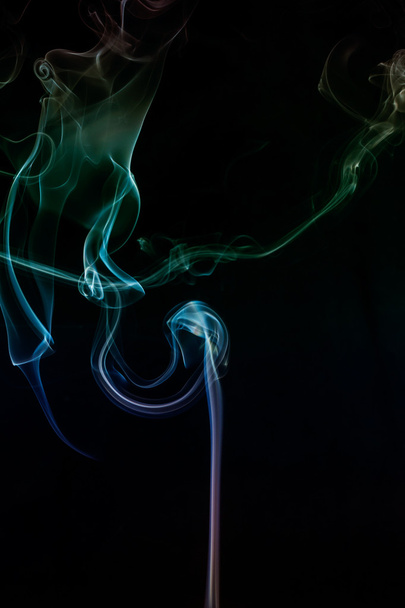 Colorful smoke abstract on black background - Foto, Imagen