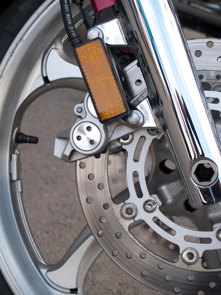 Moottoripyörän pyörän jarrutausta moottoripyörässä, moottoripyörän pyörä
 - Valokuva, kuva