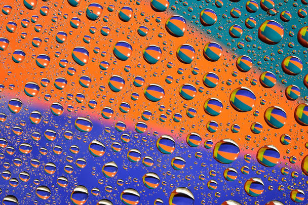Water drops on multicolor background  - Photo, Image