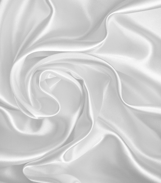 Smooth elegant white silk or satin texture as wedding background - 写真・画像