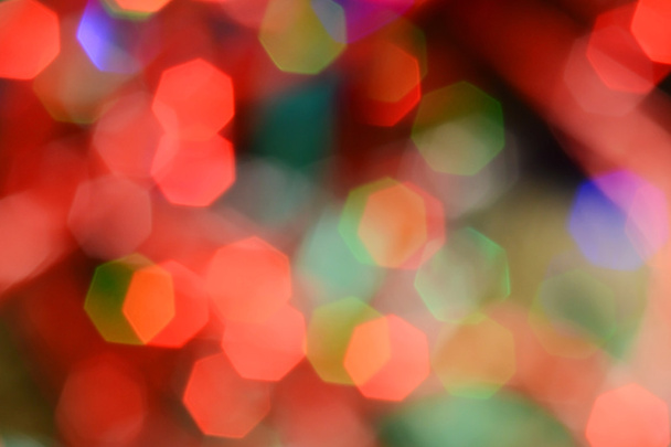 Defokussierte Weihnachtsbeleuchtung Hintergrund. - Foto, Bild