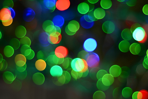 Defokussierte Weihnachtsbeleuchtung Hintergrund. - Foto, Bild