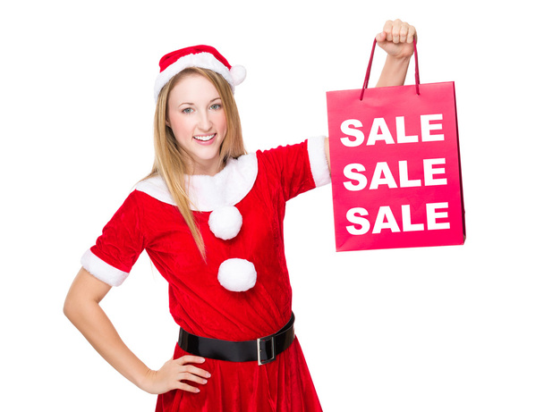 Frau im Weihnachtskostüm mit Einkaufstasche - Foto, Bild