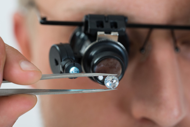 Person Looking At Diamond With  Loupe - Zdjęcie, obraz