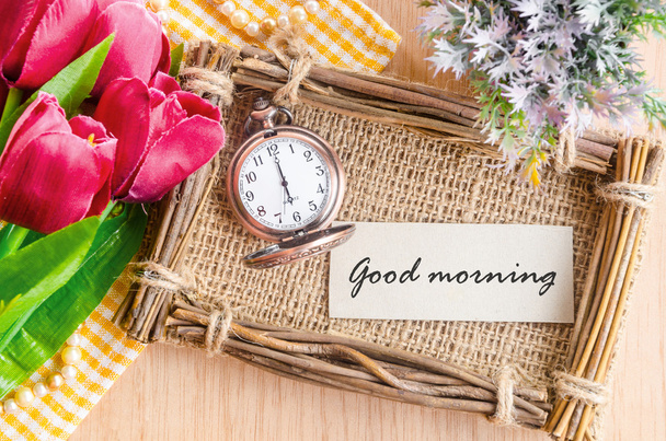Good morning tag on sack photo frame with pocket watch. - Photo, Image