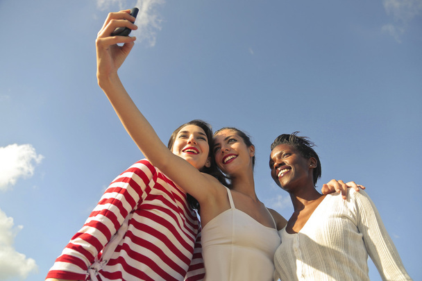 Three friends taking a picture of themselves - Foto, Imagen