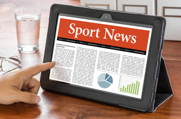 Una tableta en un escritorio - Sport News
 - Foto, Imagen