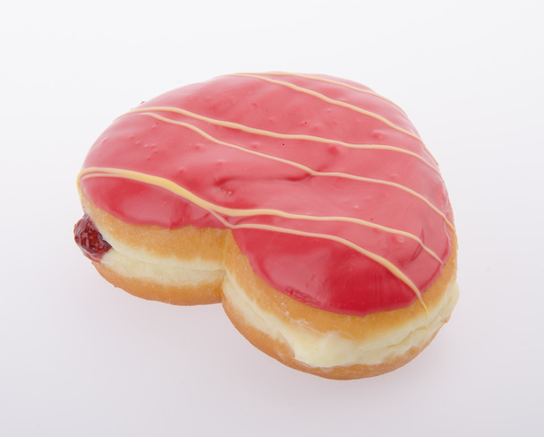Donut, Heart Shaped Pastry on background - Foto, Imagen
