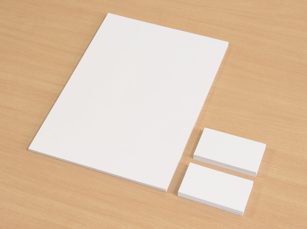 Blank business cards with a pile of papers - Photo, Image