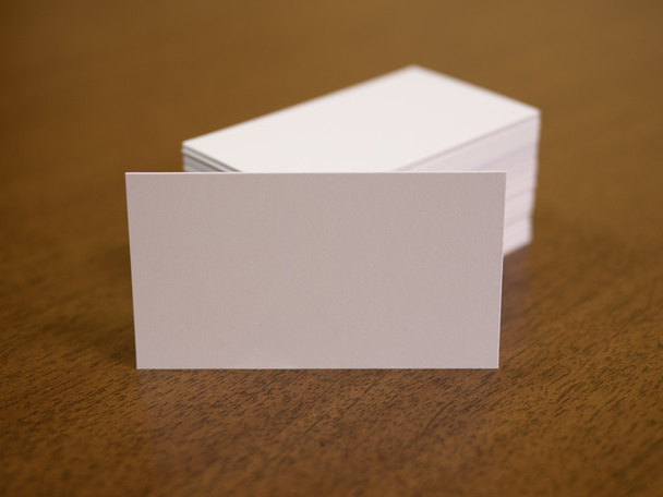  Blank defocus business cards on a wooden background - Photo, Image