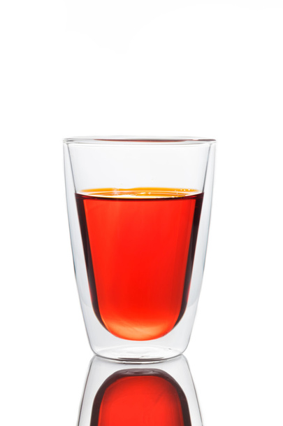 赤い水のガラス - 写真・画像
