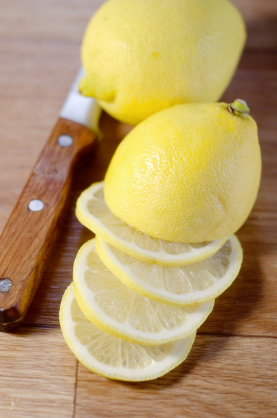 Lemon on wooden board - Photo, image