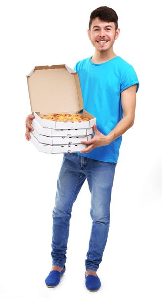 Delivery boy with cardboard pizza box isolated on white - Foto, Bild