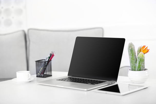 Modern workplace with laptop - Φωτογραφία, εικόνα