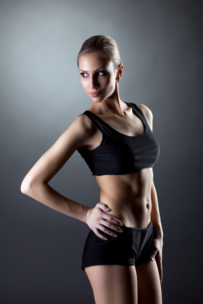 Charming blonde with perfect athletic figure - Фото, изображение