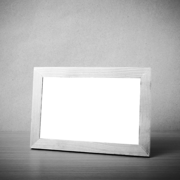 Picture frame on table - Valokuva, kuva
