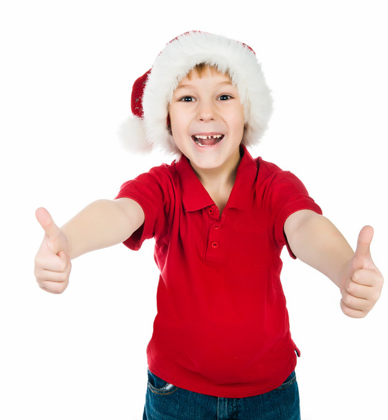 Little boy in the santa claus hat - Photo, image