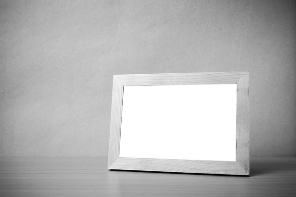 Picture frame on table - Foto, afbeelding