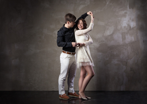 Beautiful couple in the active ballroom dance - Фото, зображення