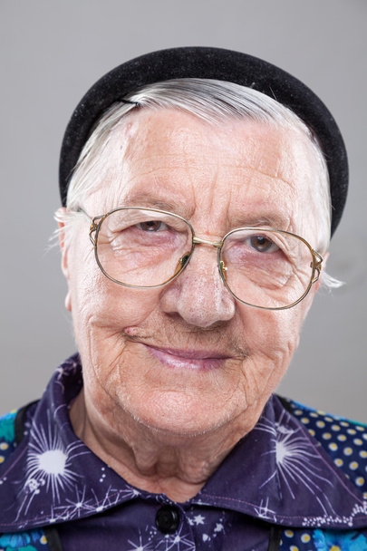 Portrait of an elderly woman with glasses - Fotografie, Obrázek