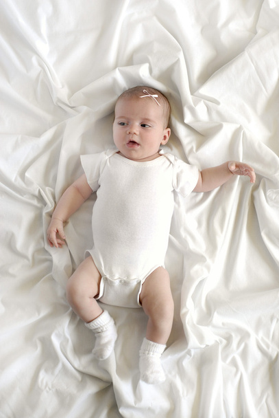 Baby on White Blanket - Фото, изображение