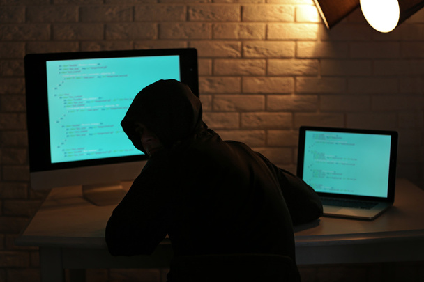 anonymous Hacker with computer  - Zdjęcie, obraz