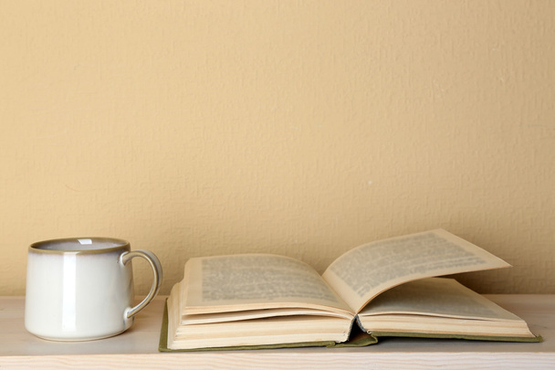 Cup of tea with book - Φωτογραφία, εικόνα