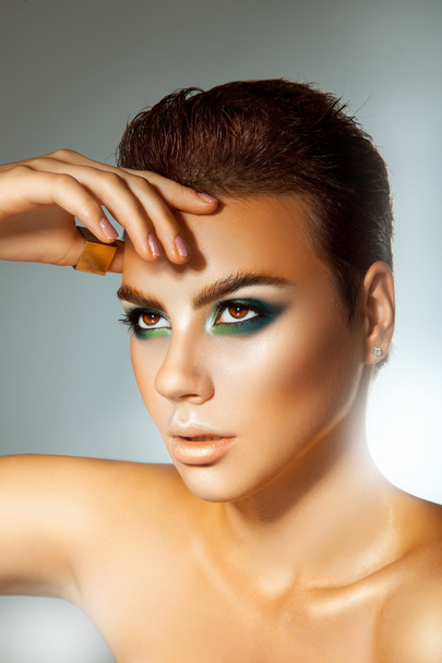 Vertical photo of young adult beautiful woman with green colors  - Φωτογραφία, εικόνα